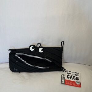 Playful little Face Clutch or Pencil Case with Zipper Design by Zipit
